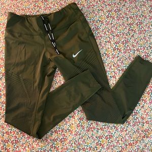 Nike Dri-Fit running leggings. Size small, olive green.
